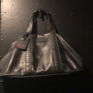 Tumi leather duffle bag